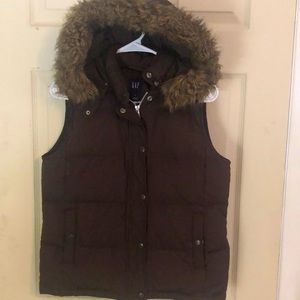 Gap brown puffer vest with faux fur hood. Size small.